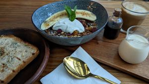 Granola with vegan yogurt and a thick slice of toast at Genius Central in Central Singapore