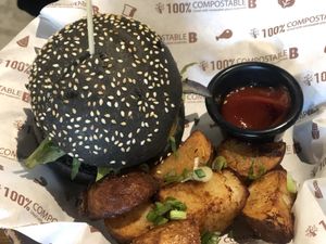 Portobello burger and crispy potatoes   at Genius Central in Central Singapore