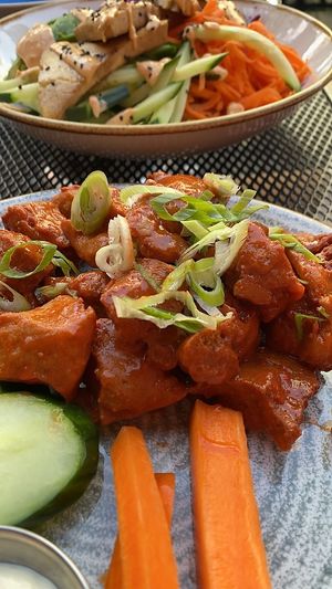 A Buffalo Chikin appetizer with an Asian Bowl the two of us.  It was plenty for us   at Vegan Street in Calgary