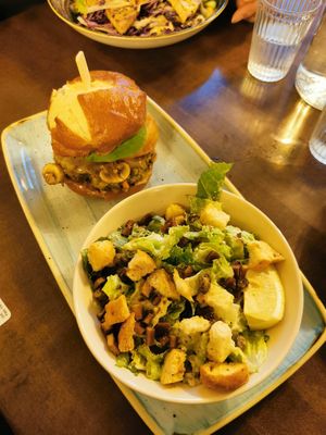 truffle mushroom burger and caesar salad at Vegan Street in Calgary