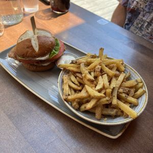 Krispy Fried Chickin Burger, side garlic fries  at Vegan Street in Calgary