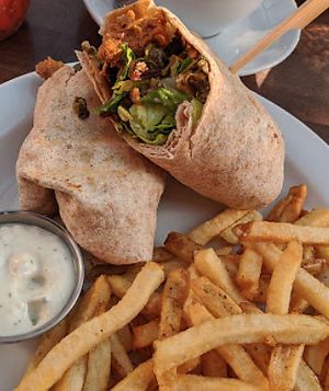 chickin caezar wrap with house seitan,  at Vegan Street in Calgary