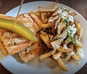 Grilled cheeze sandwich with street fries at Vegan Street in Calgary