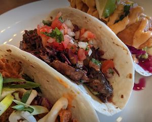 3 tacos- crispy chickin, carne asada mushroom, and no-fish at Vegan Street in Calgary