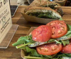 Veggie pesto sandwich and cashew cheese toast with tomato  at 1748 Bakehouse in Jacksonville