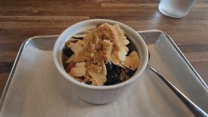 Chia pudding - banana, oat milk, almonds, brown sugar, berries (V) or coconut milk, fresh fruit, pistachio, flax seed, and toasted coconut at 1748 Bakehouse in Jacksonville