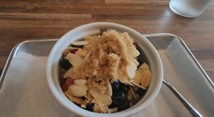 Chia pudding - banana, oat milk, almonds, brown sugar, berries (V) or coconut milk, fresh fruit, pistachio, flax seed, and toasted coconut at 1748 Bakehouse in Jacksonville