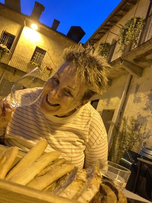 Happy me! Waiting patiently for the meal 🙂 at Un Posto a Milano in Milan