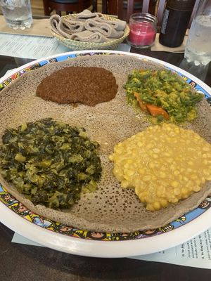Collard Greens, Smokey Lentils, Carrots and Green beans, and Split Yellow peas. All served with Injera  at Zagol Ethiopian in Reno