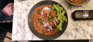 Pink crepe, cabbage and beet coleslaw, preserved lemon mayonnaise and spinach shoots at Urban Greener in Paris