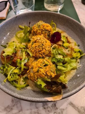 Fried balls with cauliflower sauce and leeks two ways - amazing, the braised leeks were so perfectly sweet and melt in the mouth at Urban Greener in Paris
