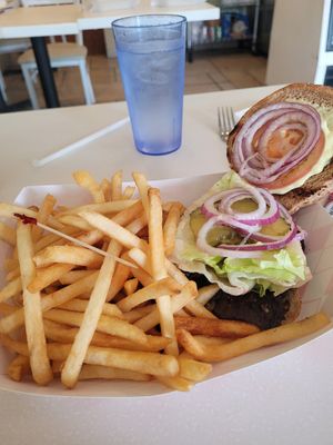 Portobello mushroom burger and fries at Loving Hut in Orange