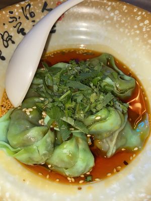 Vegan wontons with spicy sauce  at Dumpling the Noodle in Seattle