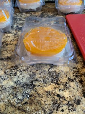 Local Kona Mango vegan cheezcake with a cashew cream base. at Kohala Grown Market in Hawi