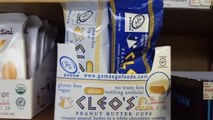 Vegan white chocolate reeses cups and the blue packet is Vegan reese's chocolate peanut butter cups  (Cleo's) at The Good Earth Natural Foods in Indianapolis