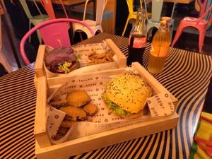 Two burgers with breaded eggplants at Flower Burger in Rome