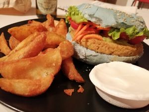 My take away yesterday. Ocean burger with spirulina and potatoes at Flower Burger in Rome