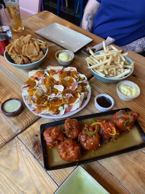 Cauli wings. Onion bhajis, poppadom nachos and gunpowder fries  at Baboo Ji in Southampton