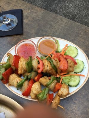 vegetables, vegan chicken grilled on a stick at Buddha Haus in Berlin