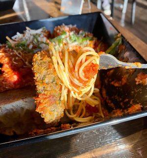 Eggplant Parmesan with pasta  at Tarantino's Vegan in Las Vegas