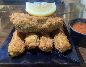 Zucchini sticks with marinara sauce   at Tarantino's Vegan in Las Vegas