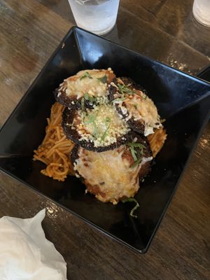 Eggplant parmigiana with gluten free spaghetti   at Tarantino's Vegan in Las Vegas