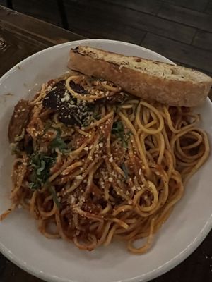 Build-your-own spaghetti with Mariana, basil, spinach, and sweet & spicy sausage (the Marina sauce is exceptionally flavorful and the sausage was fabulous and had a crispy edge!)  at Tarantino's Vegan in Las Vegas