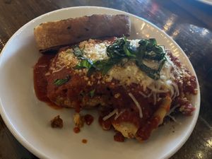 Lasagna and grilled crusty breadd  at Tarantino's Vegan in Las Vegas