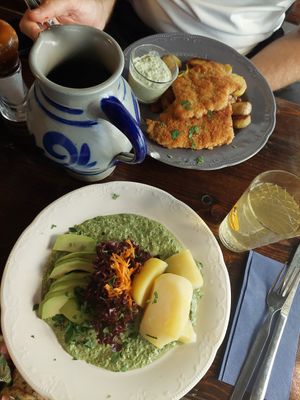 Vegan green sauce with avocado and potatoes (the schnitzel in the background is not vegan/ vegetarian) at Frau Rauscher Apfelweinwirtschaft in Frankfurt
