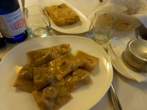 ravioli with chestnut/chickpeas filling + shallot sauce and lasagna with leek/potato  at Il Lughino in Como