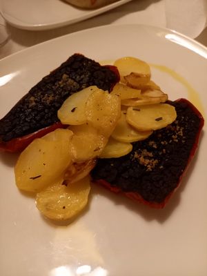 Papers with black legumes and potatoes at Il Lughino in Como