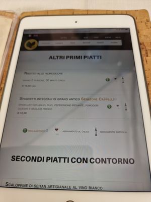 Menu is on tablet at Il Lughino in Como