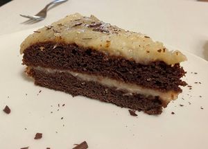 Torta al cacao con farcitura di crema al cocco at Il Lughino in Como