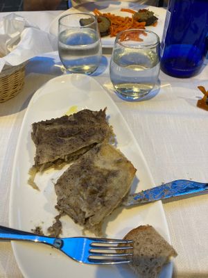 The onion lasagne with black beans at Il Lughino in Como