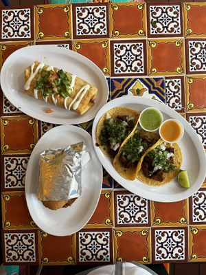 (Top)Vegetarian chimichanga, (left bottom)vegan torta, (right bottom)vegan tacos  at Jose's Torta Mexicana in Arlington