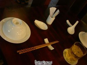 nice table, cute chopsticks! at Viet Chay in Ho Chi Minh City