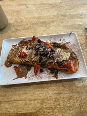 French toast with peanut butter and berries  at Vibes Cafe in South West London