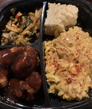 Vegan Mac and cheese, corn bread, cauliflower wings, greens! at I-tal Garden in New Orleans