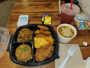 Quinoa jambalaya, creole greens, skrimps, triple mac and cheese, fried oyster mushrooms. Side of coconut curry black eye peas. RA mix drink (lemonade, ginger, hibiscus) at I-tal Garden in New Orleans