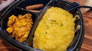 Breakfast plate, hot food served on plastic - disappointing at I-tal Garden in New Orleans