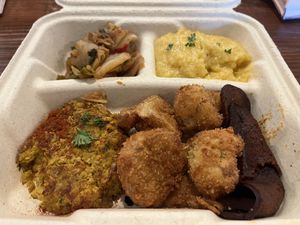 Grits, cauliflower wings, bacon, chickpea scramble, cabbage  at I-tal Garden in New Orleans