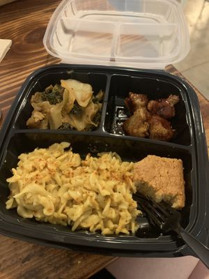 Mac plate, with corn bread, BBQ cauliwings and collard greens  at I-tal Garden in New Orleans