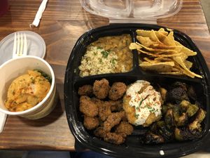 So SOOOOO good! Potato salad, crispy skrimps, creole curry blackened peas, chips n cheese, and crabless cakes. This was definitely a flavor of New Orleans! at I-tal Garden in New Orleans