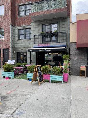 Outside  at Savage Sicko in Astoria