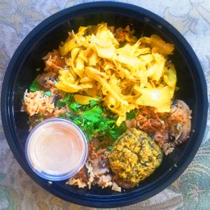 Wild Rice w\ Braised Cabbage and Stuffed Mushrooms at Meals To Heal in Caldwell