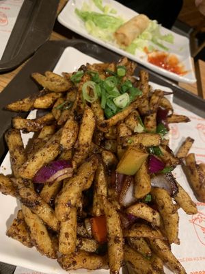 Masala chips and spring rolls (pic taken after we had started our meal, so some of the spring rolls are missing lol)  at Veggie Wok in North West London