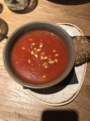Red bell peper and tomato soup with pine nuts from the spring menu. Specify vegan when ordering.  at De Beren in Goes