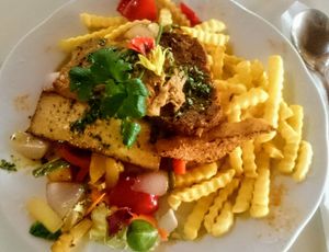 Vegan grill plate with various sorts of tofu, seitan vegetables and fries. at Der Bambiwirt in Reichendorf