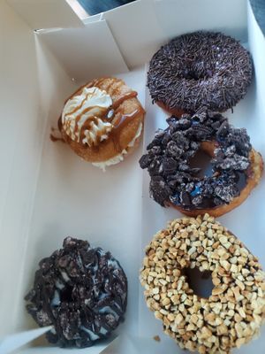 Peanut and chocolate, oreo, blueberry and chocolate sprinkles at Doughology in Babylon