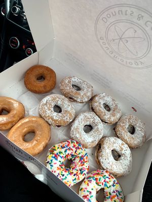 Jelly, rainbow sprinkles, glazed, and cinnamon at Doughology in Babylon